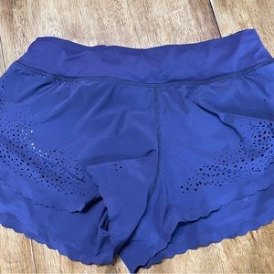 Purple eyelet edge Lululemon running shorts